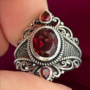 Beautiful Garnet set in sterling silver ring size 9